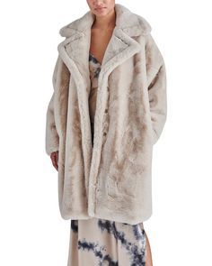 Open-front, long sleeves 100% Polyester Imported This item can only be returned by mail & not in store Beige Faux Fur Coat, Oversized Faux Fur Coat, Long Outerwear, Elevated Fashion, Long Faux Fur Coat, Oversized Coat, Oversized Silhouette, Faux Fur Coat, Online Shopping Stores