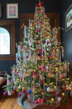 a decorated christmas tree in a living room