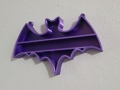 Custom Bat Shelf!  Great for knickknacks, crystals, offerings, dried flowers, etc *Size- About 5 1/2 inches top to bottom, 8 1/2 across.  * Includes- Bat shelf(with or without backing). NO HARDWARE IS INCLUDED. I am not responsible for damages to anything or anyone including walls, crystals etc. *Colors- Black White Orange/Pink Fade Marbled white and black Green/Pink/Blue Pink/Blue Satin Pink Satin Blue Satin White Satin Red Satin Purple Gold Silver Temp change Purple to pink Uv change White to Bat Shelf, Purple Shelf, Bat Wall, Monster High Party, Wall Shelf Decor, Goth Decor, Macrame Wall Art, Spooky Decor, Dark Photography