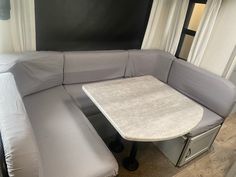 a couch and table in a small room