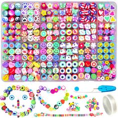 an assortment of buttons and beads in a plastic case