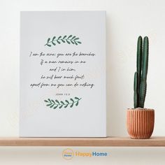 a potted cactus next to a white canvas with the words i am there you are in heaven