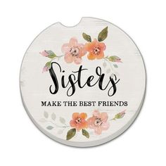 a white sign that says sisters make the best friends with flowers and leaves on it