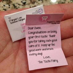 two pieces of pink paper with writing on them in someone's hand, one has a note attached to it