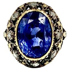 Exceptional natural color change sapphire and rose cut diamond Georgian Period ring. The sapphire of Sri Lankan origin, lively blue color changing to violet, approximately 8 carat, measuring 12.63 x 9.08 x 7.52mm, surrounded by eight near colorless rose cut diamonds. Accompanied by a GIA Sapphire Origin Report stating that the sapphire is natural, no indication of heating, Sri Lanka origin, color changing from blue to violet. Over ninety percent of sapphires in the current market have had color Period Color, Color Change Sapphire, 18k Gold Ring, Natural Sapphire, Sapphire Gemstone, British Royal Family, Rose Cut Diamond, Sapphire Diamond, Kate Middleton