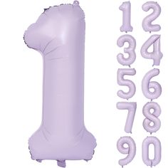 an inflatable number one balloon next to the numbers 1, 2, 3, and 4 balloons