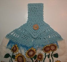 a crocheted bag with sunflowers on it