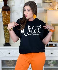 Introducing our "Witch With Attitude Graphic Shirt," a bold and stylish choice for the spooky season. Available in sizes S through 5XL, this shirt features a striking design that embodies the fierce and fun spirit of Halloween, perfect for those who love to celebrate with a touch of attitude.
Crafted from high-quality, soft materials, this shirt ensures all-day comfort, making it ideal for Halloween parties, haunted house visits, or casual outings during the spooky season. The "Witch With Attitu Black Witchy Tops With Letter Print, Pre-shrunk Black Shirt For Fall, Witchy Letter Print T-shirt For Fall, Witchy Crew Neck T-shirt For Fall, Fall Witchy Graphic Print T-shirt, Fall Witchy Crew Neck T-shirt, Witchy Cotton T-shirt For Fall, Spirit Of Halloween, Casting Spells