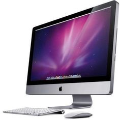 an apple desktop computer sitting on top of a white desk next to a keyboard and mouse