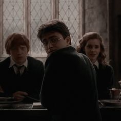 the harry potters are sitting at their desk