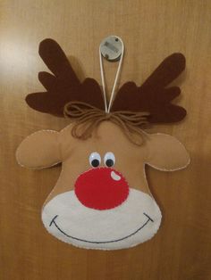 a door hanger with a reindeer's head on it