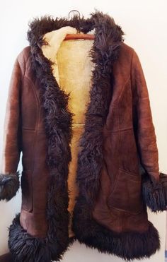 Vintage sheep fur genuine Leather coatFur lining is soft and nice Very beautiful and warm.100% sheep  fur,  LeatherBest Fit size  S MeasurementsShoulder width 41 cm / 16.14   inch Armpit to armpit  51  cm / 20.07  inch Length 85  cm /   33.46  inch   Good  vintage condition.  There are some stains aged.>>> FREE Shipping all  world wide.feel free to contact us if you have any questions.Really like vintage? We too! Get to know us here ▻▻▻https://www.etsy.com/uk/shop/DorisVintage/about?ref Sheepskin Long Fur Coat For Cold Weather, Sheepskin Long Coat For Cold Weather, Long Mink Sheepskin Fur Coat, Mink Colored Long Sheepskin Fur Coat, Coat Fur, Women Coat, Designer Scarves, Coat Women, Sheep Wool