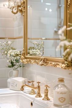 a bathroom sink with a mirror and soap dispenser