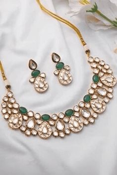 Gold Emerald Stones Kundan Necklace Set Zevar by Geeta - Fabilicious Fashion Gold Kundan Necklace As A Gift, Gold Jewelry Sets With Gota Work For Gifts, Elegant Kundan Necklace With Gota Work For Ceremonial Occasions, Elegant Ceremonial Kundan Necklace With Gota Work, Luxury Kundan Jewelry Sets For Festive Occasions, Elegant Kundan Necklace With Gota Work For Festivals, Elegant Festive Jewelry Sets With Gota Work, Luxury Gold Jewelry Sets With Stone Work, Luxury Kundan Necklace For Festivals