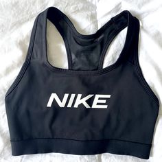 Nwot Women’s Nike Dri-Fit Sports Bra In Size Small! Black With White Nike Printed On The Front And A White Band Going Down The Back In The Middle Of A Black Mesh Section. Nike Fitted Sports Bra For Running, Nike Fitted Running Sports Bra, Nike Fitted Gym Activewear, Nike Fitted Activewear For Gym, Nike Fitted Racerback Sports Bra, Nike Fitted Sports Bra Sweat Resistant, Nike Supportive Activewear For Gym, Nike Sporty Fitted Sports Bra, Nike Fitted Sweat Resistant Sports Bra