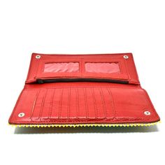 Our beautiful Karungi Beaded Leather wallet - in red leather with a multi-colored front - is the perfect size to carry all your necessities. Has an inner compartment for credit cards with a zippered pocket, this wallet can be used in a variety of ways. Each bag is handmade by female artisans in South Africa, meaning no two bags are exactly alike. Measurements: 10" W x 1" H x 4" W Beaded Wallet, Bead Leather, Lost & Found, Women Artisans, Pet Owners, Credit Cards, Red Leather, Leather Wallet, South Africa