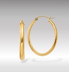 Introducing our 14K Yellow Gold Polished 3.5mm Thick Slim Oval Hoop Earrings, a quintessential piece that marries the timeless elegance of classic hoop earrings with the modern appeal of a minimalist design. These exquisite earrings are crafted from premium 14K yellow gold, polished to a radiant sheen that enhances their sleek and slim profile. The oval shape offers a contemporary twist on the traditional round hoop, providing a flattering elongated look that accentuates the jawline and cheekbones. At 3.5mm thick, these hoops strike the perfect balance between delicate and noticeable, making them versatile enough for both day-to-day wear and special occasions. These hoop earrings are designed for those who appreciate the beauty of simplicity in their jewelry. Their polished finish catches Classic Tarnish-resistant Oval Hoop Earrings, Everyday Tarnish-resistant Oval Hoop Earrings, Minimalist Oval Hoop Earrings Tarnish Resistant, Minimalist Oval Tarnish Resistant Hoop Earrings, Minimalist Oval Hoop Earrings For Anniversary, Minimalist Oval Tarnish-resistant Hoop Earrings, Minimalist Tarnish-resistant Oval Hoop Earrings, Oval Hoop Earrings, Earrings Classic