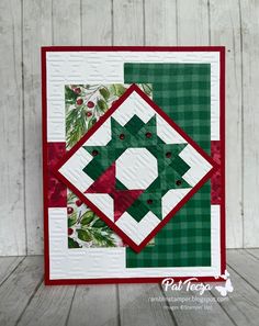 a quilted christmas card with green and red accents