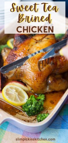 a person cutting up a chicken with a knife and fork in it on a plate