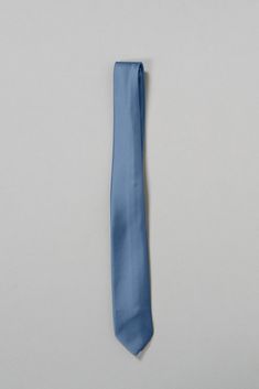 It's a perfect color match! Our Satin Tie will provide that finishing touch to your cohesive wedding look! Classic in design our tie lends a stylish and comfortable fit. *Please note, our "Ready to Ship" Tie option only comes in the Regular Tie Length; 58 inches from end to end. FEATURES: Semi-shine charmeuse satin material, unlined Classic narrow-width design Blue Ties For Wedding Neckwear, Elegant Light Blue Tie For Black Tie Events, Fitted Blue Neckwear For Black Tie Events, Blue Wedding Neckwear With Ties, Blue Standard Tie For Wedding, Blue Satin Ties For Formal Occasions, Formal Blue Satin Ties, Elegant Blue Satin Suit And Tie Accessories, Elegant Light Blue Suit And Tie Accessories For Wedding