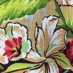 an image of a floral fabric with flowers and leaves on the side, close up