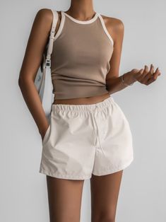 Relaxed fit swim shorts in nylon. Short length. Elasticized waistband and drawstring tie. Model is in MINUSEY S. ✔️ Free worldwide express shipping over $100✔️ Loved by 6,500+ customers✔️ Limited edition collections, maximum style⠀⠀⠀⠀⠀⠀⠀⠀⠀Stay ahead of the trend with can’t-find-anywhere-else staples. Your closet will thank you 💕 * MINUSEY S = EU 34, US 2* MINUSEY M = EU 36, US 4* 100% Nylon* Dry clean* Made in Korea - Model Height: 170cm/5'7" (US2, EU34) Summer Workout Shorts With Functional Drawstring, White Nylon Drawstring Shorts, Sporty Drawstring Shorts For Poolside, Summer Workout Shorts With Drawstring, Beige Workout Shorts For Summer, Summer Nylon Drawstring Shorts, Summer Nylon Shorts With Drawstring, White Summer Shorts With Functional Drawstring, Trendy Summer Bottoms With Functional Drawstring