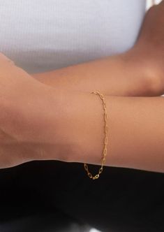 "This beautiful dainty mini paperclip chain bracelet will be a perfect everyday piece. Made entirely of solid 10k yellow gold and finished with a lobster clasp.  chain links are 5mm long and 2mm wide.  Options: 1) You can also add a tiny bezel set gemstone charm: -4mm round amethyst, 3x6mm marquise amethyst, 5x7mm garnet or 4x6 pear peridot. All these stones are also set in solid gold.  2) bracelet can be made 6\", 7\" or 8\" long." Mini Bracelet, Chain Links, Trombone, Arm Candy, Chain Link Bracelet, 10k Gold, Paper Clip, Link Bracelets, Arm Band