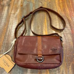 Nwt Wild West Cognac Brown Leather Adjustable Cross Body Bag. Length - 6" Width - 10" Depth - 2.25" Black Bucket Bag, Pet Carrier Bag, Red Crossbody, Brown Leather Handbags, Leather Saddle Bags, Brown Purses, Crossbody Wallet, Coach Crossbody Bag, Perforated Leather