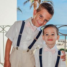 "Your guy will be the talk of the event when he arrives wearing this classy navy and blush pink ring bearer outfit! These navy blue suspenders and coordinating blush pink bow tie are perfect for a ring bearer, cake smash outfit, 1st birthday outfit, wedding, family photoshoot or other special occasion. The fully adjustable navy suspenders come in multiple sizes and are made with extremely stretchable elastic for a comfortable fit. The silver clasps easily attach to most clothing. The 100% cotton Ring Bearer Outfit Pink, Ring Bearer Outfit Navy, Navy Blue Suspenders, Toddler Suspenders, Blue Suspenders, Suspenders For Boys, Suspenders Wedding, Wedding Blush, Bearer Outfit