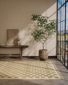 a living room with a potted plant next to a bench and large glass windows