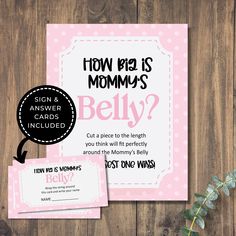 a pink and black baby shower card with the words how big is mommy's belly?