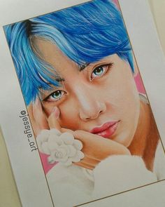 a drawing of a person with blue hair and a flower in his hand next to a white paper