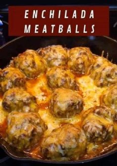 a skillet filled with meatballs covered in cheese