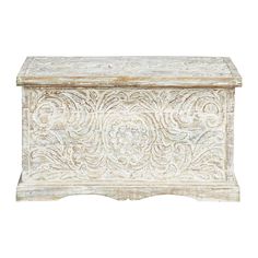 an old wooden box with carvings on the front and sides, isolated against a white background