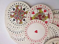 several playing cards are arranged on top of each other