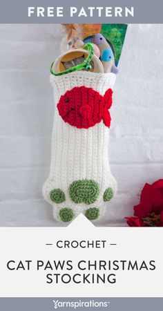 crochet cat paws christmas stocking with text overlay that reads free pattern