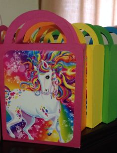 there is a bag with a unicorn on it and many other bags in the background