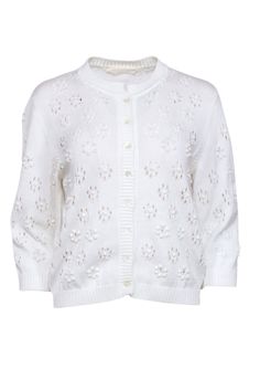 Wrap yourself in whimsical charm with our Valentino ivory flower eyelet cardigan. This button up cardigan features unique flower textured eyelet detailing, adding a touch of cottage-core aesthetic to your look. Stay cozy and stylish with this must-have addition to your wardrobe. Size M (based on measurements) 100% Cotton Unlined Button front Flower knit detail Bust 40" Waist 40" Shoulder to hem 21.5" Sleeve length 19" Cream Pointelle Knit Spring Cardigan, Feminine Spring Cardigan With Pointelle Knit, Cream Cardigan With Buttons For Spring, Classic Spring Cardigan With Pointelle Knit, Classic Spring Cardigan In Pointelle Knit, Classic Spring Pointelle Knit Cardigan, Classic Pointelle Knit Cardigan For Spring, White Daywear Sweater With Button Closure, Classic White Spring Cardigan