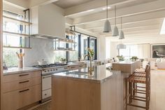 the kitchen is clean and ready to be used as a dining room or living room