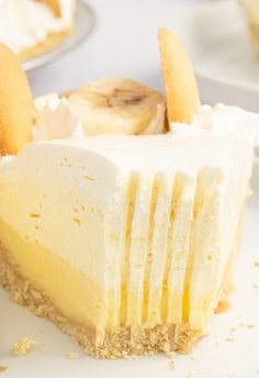 a piece of cheesecake with banana slices on top