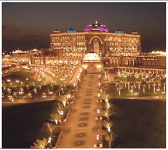 an aerial view of a large building at night