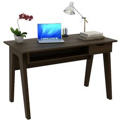 a laptop computer sitting on top of a wooden desk next to a lamp and books