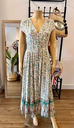 Boho hippie style long dress. Buttons at front. Drawstring waist. Gorgeous boho floral print. Made of cotton viscose. Light green color. Boho White Dress, Cotton Boho Dress, Boho Hippie Dress, Hippie Dress, Dress Buttons, Hippie Dresses, Dress Cotton, Dress Boho, Cotton Viscose