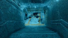 the stairs are covered in blue and yellow paint, with water coming down them to the floor