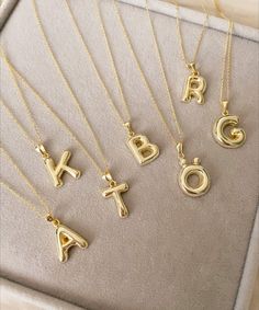 Bubble Letter Necklace Carry your initial or a special someones around with you wherever you go with this beautiful initial necklace. It is the perfect necklace to wear everyday or on special occasions, it also layers good with other pieces. It is definitely a must-have for everyone's jewelry box. Features: * This necklace is made of patented 925 Sterling Silver. * It has a 45cm chain and approximately 1.5 cm pendant (Sizes can vary between letters) Packaging: You will get your jewelry in a beau