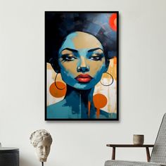 an abstract painting of a woman's face on a white wall above a chair