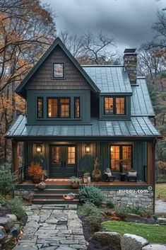 a house with a stone walkway leading to the front door