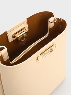 Beige Alcott Bucket Bag - CHARLES & KEITH US Charles And Keith, Trapeze Bag, Off Duty Outfits, Chic Crossbody Bag, Mini Bucket Bags, Mini Bucket, Classic Handbags, Bags Shop, Classic Bags