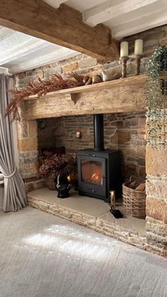 a living room with a fire place next to a window