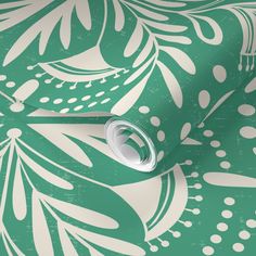 a green and white wallpaper with an abstract design on the back side of it